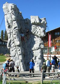 Climbers on the outdoor climbing wall at Mammoth Mountain Main Lodge