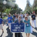 064: Lisa Trankley and Vicki Paterno carry the Class of ’75 standard during the Parade of Classes to the Wash
