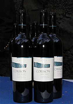 full bottles of 2001 Corison Cabernet Sauvignon standing on a table