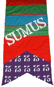 The class of 1975's banner, reading 'SUMUS'